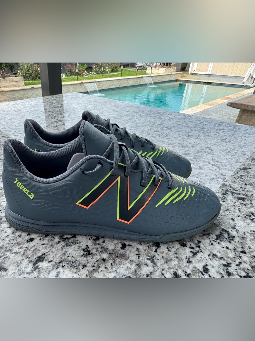 New Balance Charcoal Athletic Shoes with Neon Green and Orange Accents